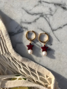 Gold plated stainless steel hoops with freshwater baroque and dark red star bead